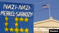 A banner in front of the Greek parliament during a rally against austerity measures in Athens