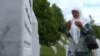 Bosnia and Herzegovina - Mejra Djogaz from Srebrenica visits the graves of her sons every day in Potocari Memorial Center. June 2021