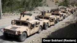 AFGHANISTAN -- Afghan Commando forces armoured convoy leaves toward the front line, at the Ghorband District, Parwan Province Afghanistan June 29, 2021.
