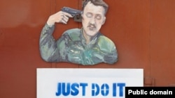 Карикатура художника Сергія Захарова на російського полковника Ігоря Гіркіна (Стрєлкова), який, на той час був так званим «міністром оборони» угруповання «ДНР», що визнане в Україні терористичним. Донецьк, 2014 рік