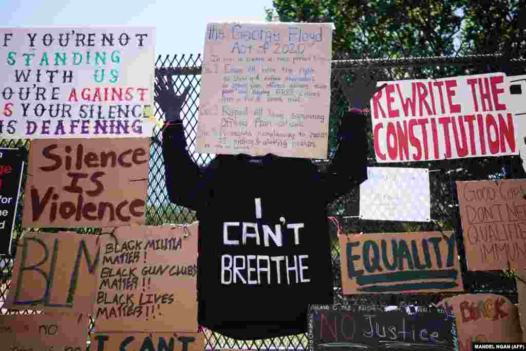 Перед Белым домом в Вашингтоне. На футболке у участника протеста надпись "Я не могу дышать" – Флойд говорил эти слова полицейскому, действия которого привели к его гибели