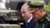 Президент Росії Володимир Путін і міністр оборони Сергій Шойгу