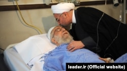 Iranian President Hassan Rohani visits Supreme Leader Ayatollah Ali Khamenei in the hospital on September 8.