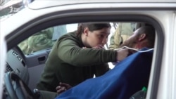 Посеред вогню. Сльози та сподівання Авдіївки (відео) Посеред вогню. Сльози та сподівання Авдіївки (відео)