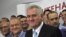 Serbian President-elect Tomislav Nikolic (foreground) celebrates his election victory with supporters in Belgrade.