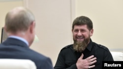 Глава Чечни Рамзан Кадыров на встрече с президентом Владимиром Путиным, архивное фото