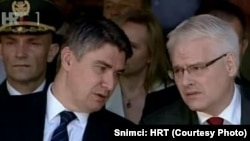 Зоран Миланович (хорватский премьер-министр) и Иво Йосипович (президент Хорватии) во время празднования Дня Победы в Брезовицы, Сисак, 22 июня 2014 года