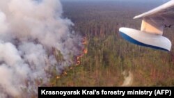 Пожежі в Красноярському краї Росії, фото з борту пожежного літака, 30 липня 2019 року