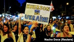 Ілюстраційне фото. Під час маршу проти спроби Росії анексувати чотири частково окуповані регіони України. Барселона, Іспанія, 14 жовтня 2022 року