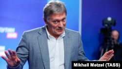 Пресс-секретарь президента России Дмитрий Песков в предвыборном штабе Владимира Путина, 18 марта 2018 года