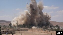 Боевики экстремистской группировки "Исламское государство" взорвали здание тюрьмы в сирийской Пальмире (30 мая 2015 года)