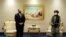 Former U.S. Secretary of State Mike Pompeo meets with Mullah Abdul Ghani Baradar, the head of the Taliban's peace negotiation team, amid talks between the Taliban and the Afghan government in Doha on November 21, 2020.