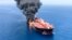 AR SEA -- An oil tanker is seen after it was attacked at the Gulf of Oman, June 13, 2019