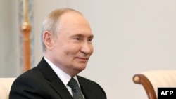 Vladimir Putin a lăudat eforturile Washingtonului de rezolva conflictul din Ucraina