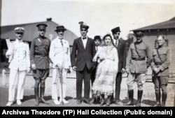 Weinberg (far left) in his 1921 naval character with "Princess Fatima," her sons, and several unidentified men.