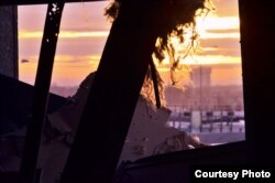 Захід сонця в Донецькому аеропорту з боку Донецька. Автор – Руслан Боровик