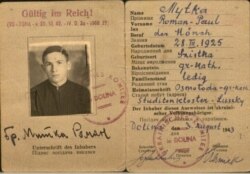 Довідка, видана Курту Левіну, на ім’я Роман Митка