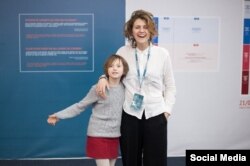 Юлія Соболь з донькою