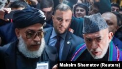 پخوانی افغان ولسمشر حامد کرزی او طالب استازی شېر محمد عباس ستانکزی د مسکو په غونډه کې