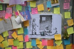 تصاویری از یادداشتهای همدلانه با خانواده زاغری-رتکلیف در زمان اعتصاب غذای همسر نازنین زاغری در مقابل سفارت ایران در لندن