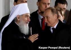 Тодішній патріарх Сербської православної церкви Іриней (ліворуч) і президент Росії Володимир Путін. Белград, 17 січня 2019 року