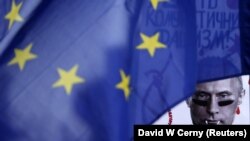 Зображення російського президента Володимира Путіна під час акції протесту у столиці Чехії проти збройної агресії Росії у Криму. Прага, 8 березня 2014 року