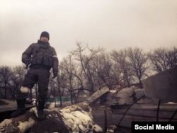 Бато Домбаев на танке, около украинского города Углегорск (Донецкая область)