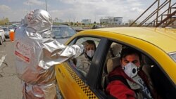 Медичний працівник проводить тестування на наявність коронавірусу, Тегеран, 26 березня 2020 року