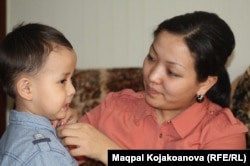 Dinara Qiyalova with her son, Abzal