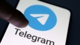 Логотип месенджера Telegram, ілюстративне фото