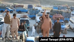 Pakistani traders, who deal in the Iranian fuel trade across the border, protest after the Pakistani government banned smuggled Iranian diesel, in Panjgur, Balochistan Province, in October 2019.