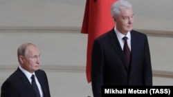Президент РФ Владимир Путин и мэр Москвы Сергей Собянин во время церемонии инаугурации