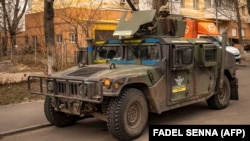 د اوکراین پوځ د کييف په څنډو کې د ګزمې پر مهال. انځور له ارشېفه