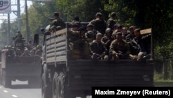 Проросійські бойовики так званого батальйону «Восток» на вулицях Донецьком, 10 липня 2014 року.