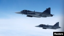 Літаки-винищувачі Saab JAS 39 Gripen під час патрулювання, фото ілюстративне