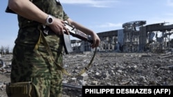 Руїни Міжнародного аеропорту «Луганськ» після боїв Збройних сил України із російськими гібридними силами, 11 вересня 2014 року