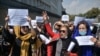 Afghan women take part in a protest march for their rights under the Taliban rule in the downtown area of Kabul on September 3.