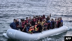 Беженцы на надувной лодке
