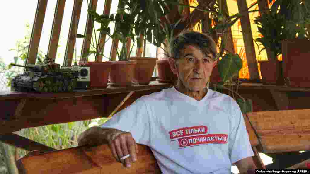 Активист говорит, что причиной стала его фотография в футболке со свастикой, которую нашли у него в шкафу. Однако Приходько говорит, что ее не публиковал: «Да, признаю, такое было. Фото сделано в 2009 году, однако я не публиковал его в соцсетях и не выставлял на всеобщее обозрение. О какой демонстрации или пропаганде может идти речь?»