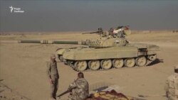 Иракские силы взяли штурмом город Хамдания, удерживаемый исламистами (видео) Иракские силы взяли штурмом город Хамдания, удерживаемый исламистами (видео)