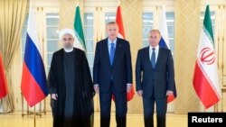(from left to right) Presidents Hassan Rohani of Iran, Recep Tayyip Erdogan of Turkey, and Vladimir Putin of Russia.