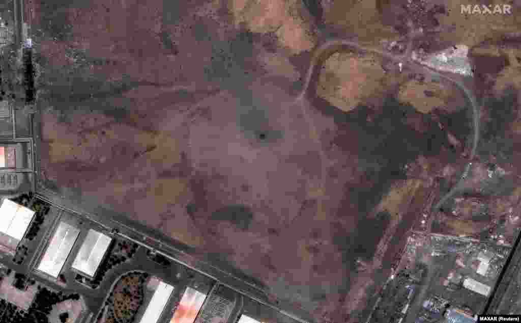 Satelitski snimak postrojenja za obogaćivanje u Natanzu napravljen 15. juna i drugi snimak napravljen 22. juna pokazuje krater nakon američkih napada.