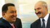 Belarusian President Alyaksandr Lukashenka (right) welcomes his Venezuelan counterpart, Hugo Chavez.