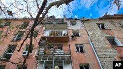 Снаряди влучили в одну з будівель у Центральному районі міста (ілюстраційне фото)