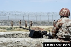 Members of Pakistan's Frontier Corps patrol near the newly inaugurated Badini Trade Terminal Gateway, a border crossing point at the Pakistani border town of Qila Saifullah, in September 2020.