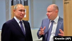 Бізнесмен Володимир Потанін (п) із президентом Росії Володимиром Путіним, 2019 рік