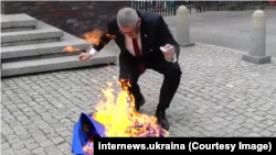 Grzegorz Braun, one of the leaders of "Confederation", tore down and set fire to the EU flag in Katowice. Poland, May 6, 2025