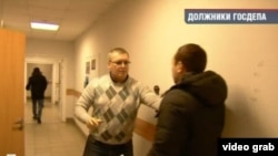 A screen grab from a supposed exposé by the Russian state channel NTV that claimed certain media outlets were doing Washington's bidding because they received funds from the U.S. financier George Soros.