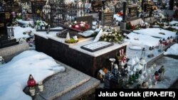 The grave of a murdered Slovak journalist Jan Kuciak at a cemetery in Stiavnik on February 20.