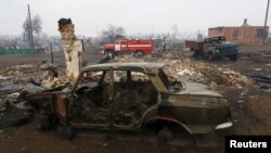 Сгоревшие автомобили в районе населенного пункта Шира